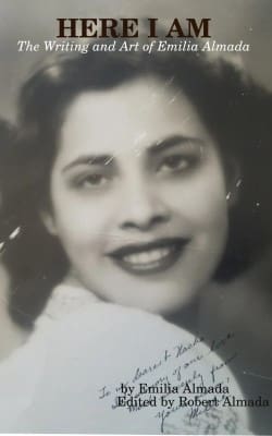 A black and white photo of a woman with dark hair.