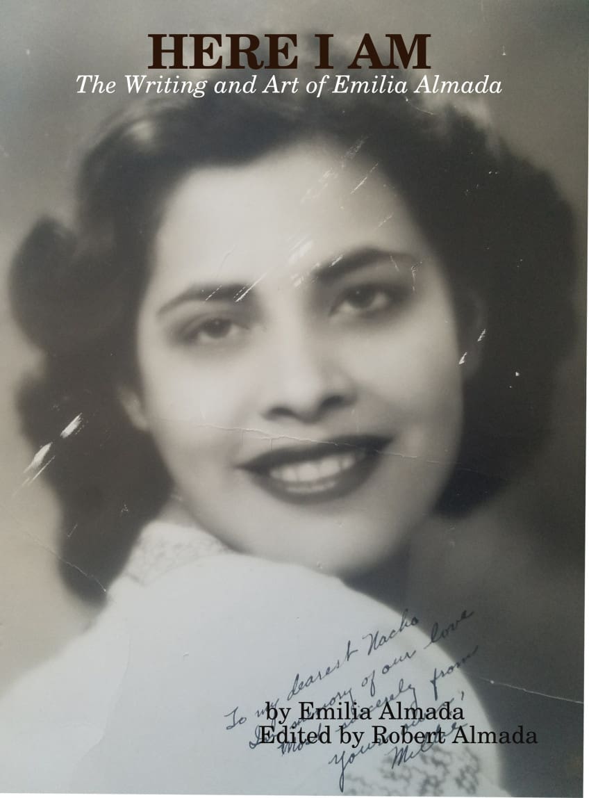 A black and white photo of a woman with a smile.